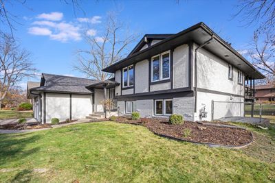 Double doors on the garage, New Roof, New Windows, freshly painted exterior | Image 3