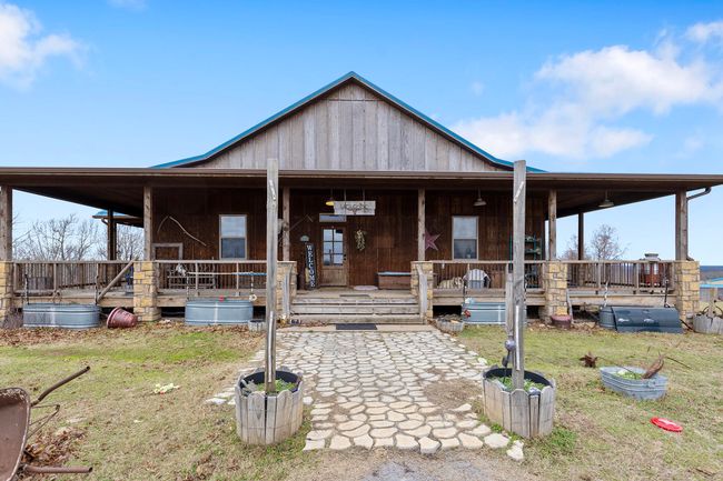 Cedar Ranch Home with wrap around porch | Image 9