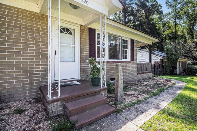 Entrance to property with brick siding | Image 5