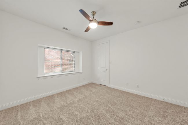 Empty room featuring baseboards, light carpet, a ceiling fan, and visible vents | Image 28