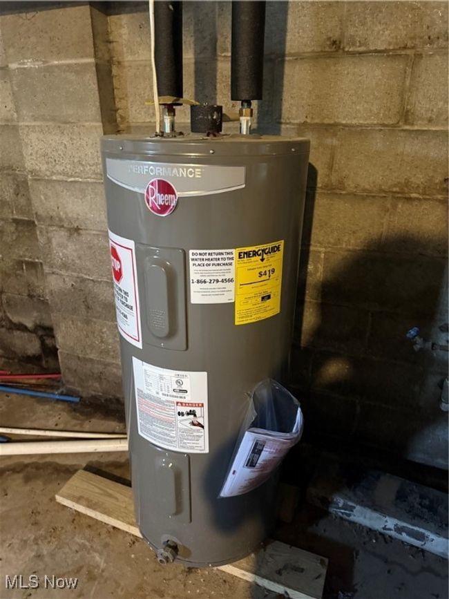 Utilities featuring electric water heater | Image 32
