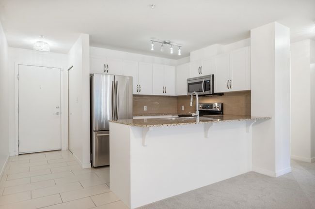 208 - 11667 Haney Bypass, Condo with 3 bedrooms, 2 bathrooms and 2 parking in Maple Ridge BC | Image 4