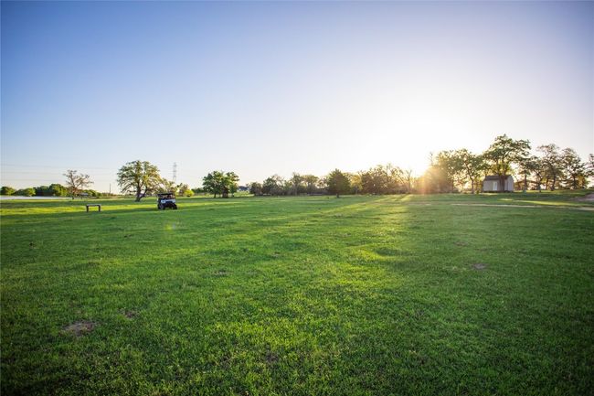 View of community with a yard and a view of countryside | Image 11