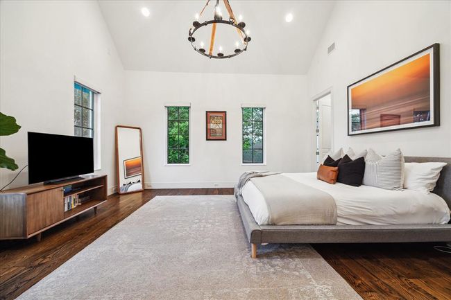 BEDROOM TWO. With all bedrooms having an en suite bathroom, any one could be the guest suite but this room at the front of the home is the biggest and is ideal for guests. Or use as a sunny playroom. | Image 22