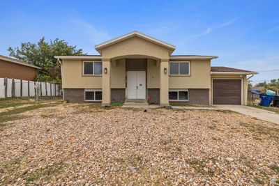 View of front of property featuring a garage | Image 2