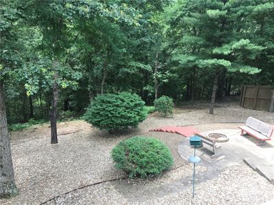 Backyard firepit and beautiful secluded forest view from the back deck! | Image 3