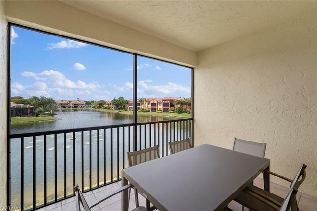 Sunroom with a water view | Image 19