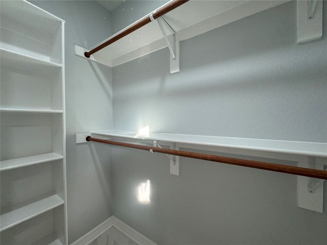 View of spacious closet | Image 17