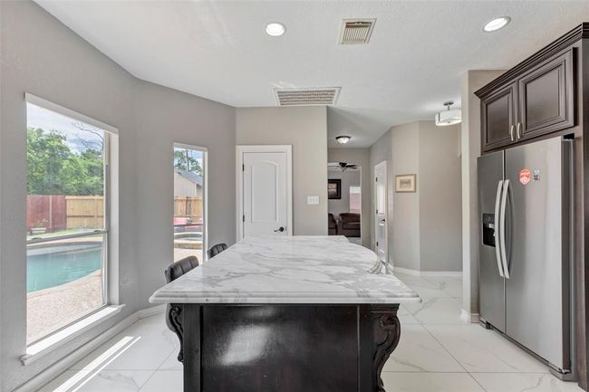 1003 Highland Woods Dr, House other with 4 bedrooms, 3 bathrooms and 2 parking in Highlands TX | Image 14