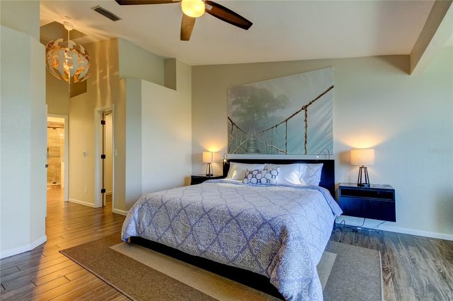 Primary Bedroom with Balcony Views | Image 28