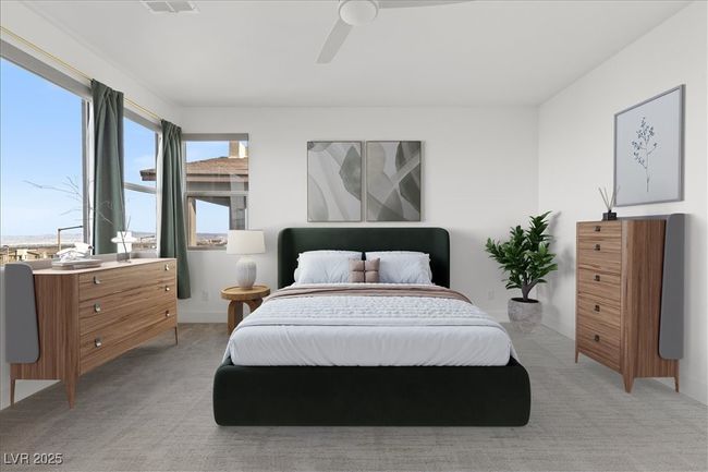 ***Virtually Staged** Bedroom featuring ceiling fan and light colored carpet | Image 11
