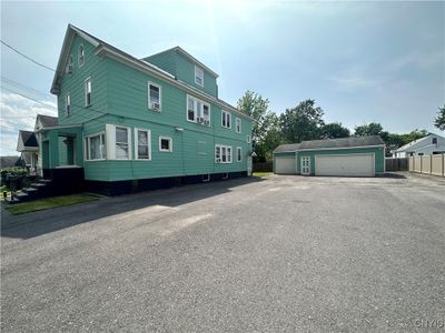 208 Brown Avenue, Home with 7 bedrooms, 4 bathrooms and null parking in Salina NY | Image 1