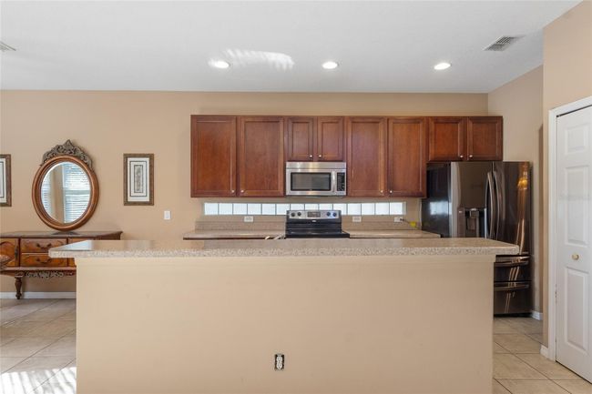 9244 Pecky Cypress Way, House other with 5 bedrooms, 4 bathrooms and null parking in ORLANDO FL | Image 13