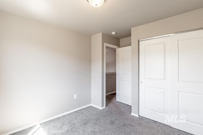 Unfurnished bedroom featuring carpet and a closet | Image 22
