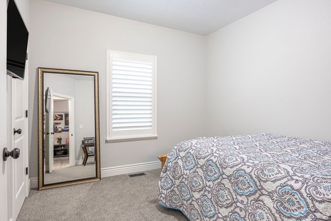 View of carpeted bedroom | Image 22