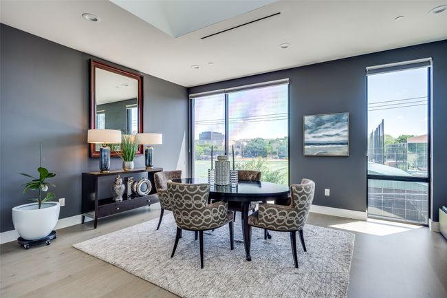 Dining room featuring recessed lighting, baseboards, wood finished floors, and plenty of natural light | Image 15