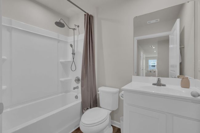 The first floor bathroom features an upgraded showered and a convenient bidet attachment for added comfort and luxury. | Image 26