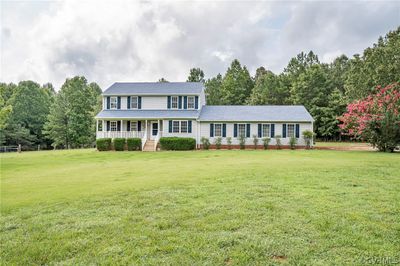 Colonial-style house with a front yard | Image 3