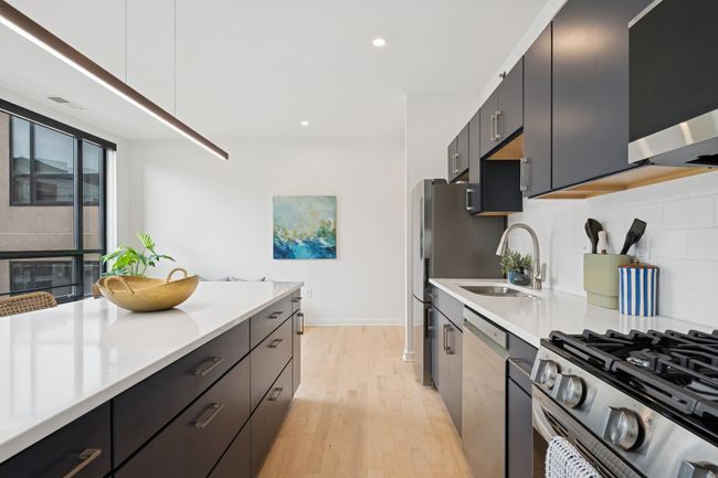 Expansive countertops make prep and presentation a breeze—ideal for those who love to cook and entertain. | Image 8