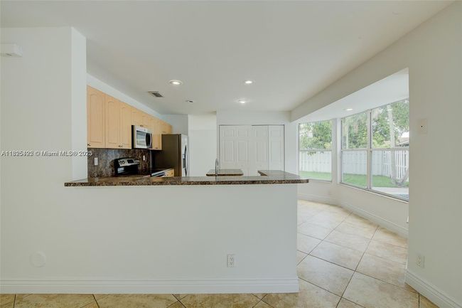 1127 Sw 104 Th Way, House other with 4 bedrooms, 3 bathrooms and null parking in Pembroke Pines FL | Image 12