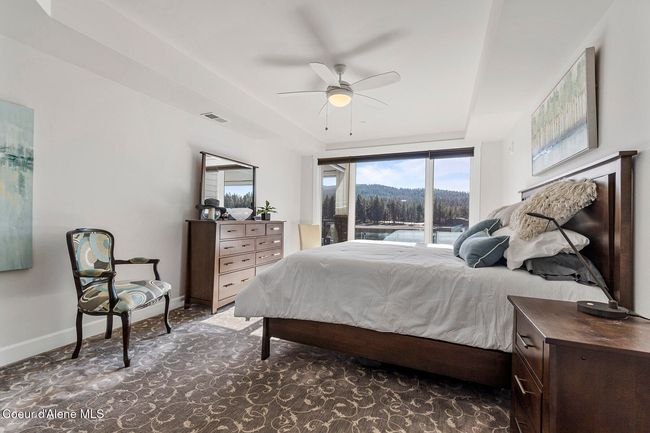 Ceiling fans & large floor to ceiling glass | Image 14