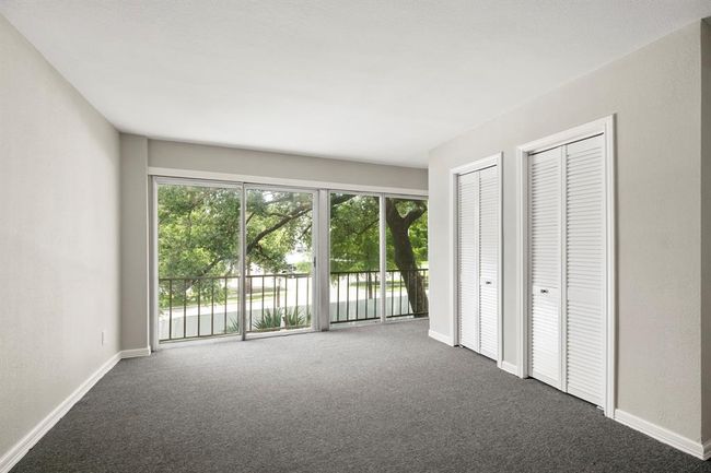 1st bedroom with plenty of natural lighting. | Image 8