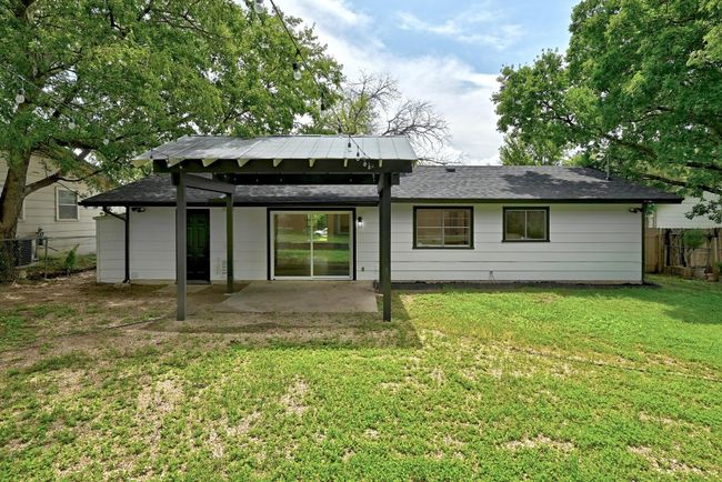 Back of property with a patio area and roof with shingles | Image 26