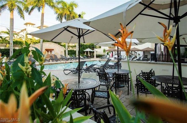 View of swimming pool featuring a patio area | Image 33