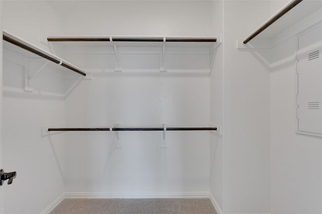 View of spacious closet | Image 8
