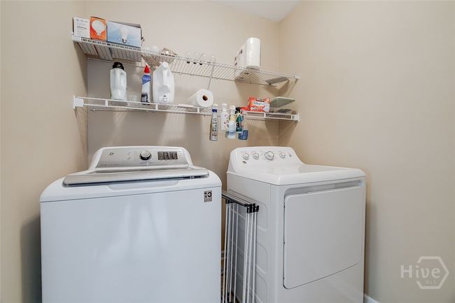 Laundry room upstairs conveniently located close to the bedrooms. | Image 40