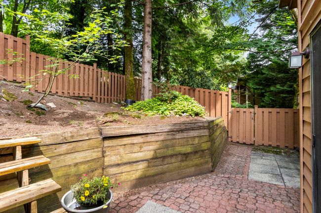 Fenced backyard featuring a patio | Image 34