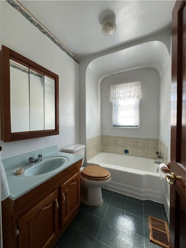 Wide angle view of main level full bath. | Image 11