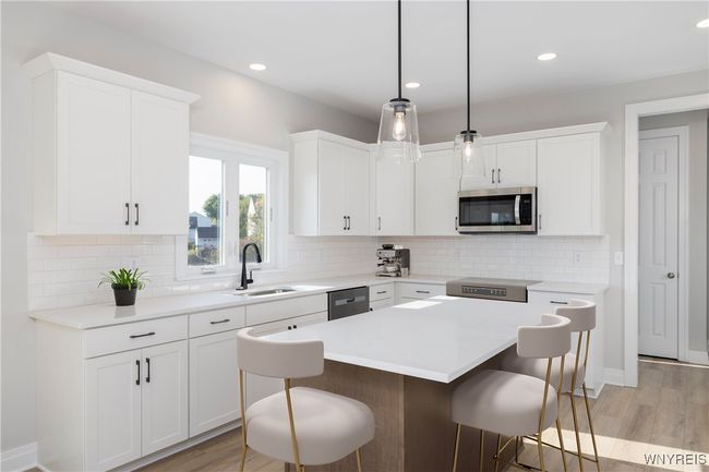 5667 Dorothy Cir, House other with 4 bedrooms, 3 bathrooms and null parking in Clarence Ctr NY | Image 4
