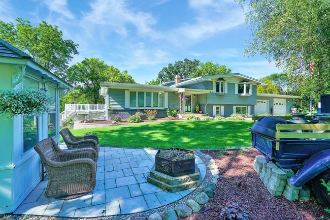 Enjoy peaceful times in the screened gazebo and on this beautiful patio. | Image 47
