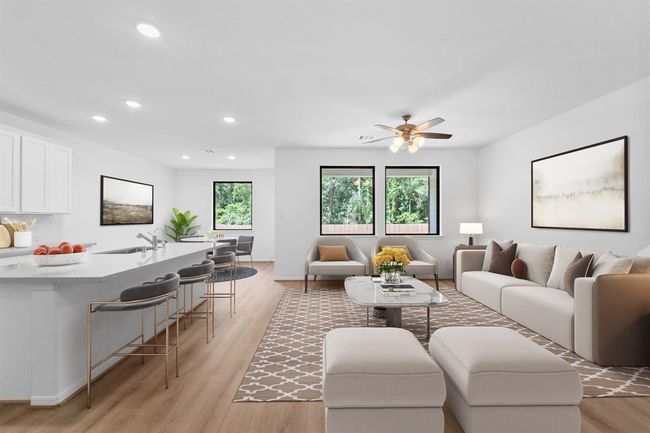 This home boasts a spacious open concept layout that combines the best of modern design and comfort for everyday living. | Image 7