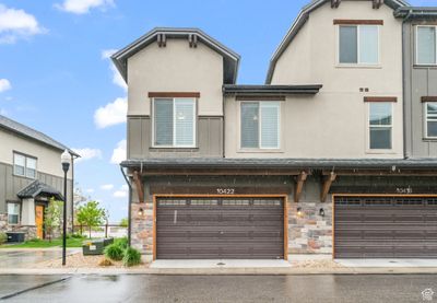 View of front facade featuring a garage | Image 2