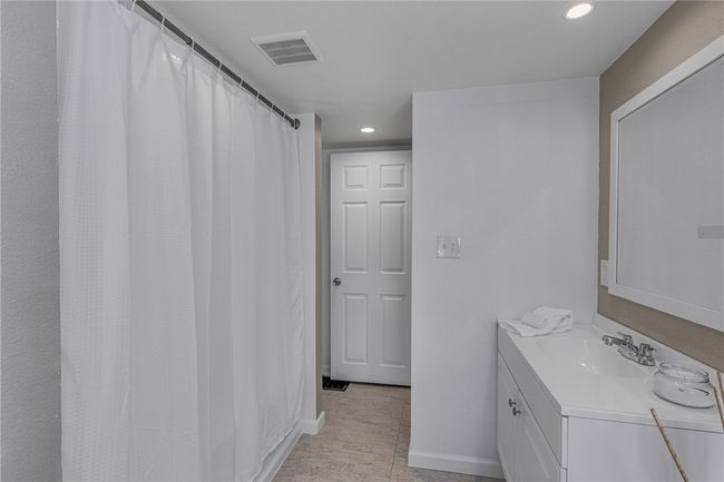 Updated upper level full bath. | Image 21