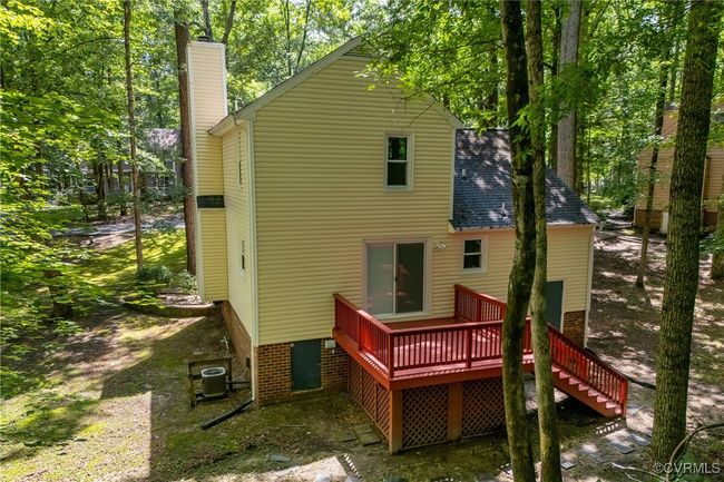 Rear view of house with deck | Image 29