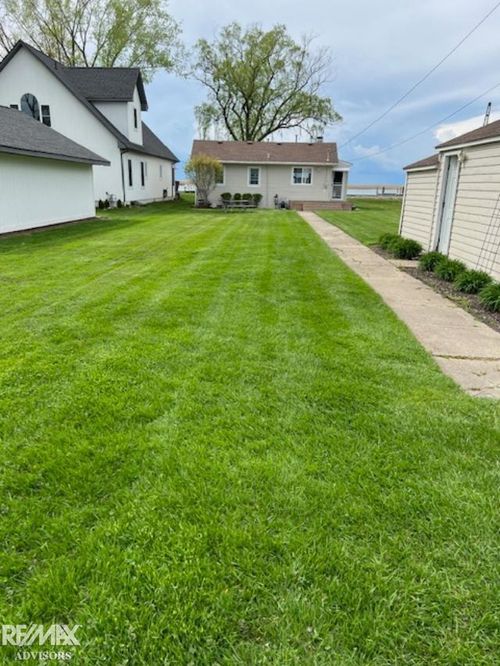 7054 Middle Channel Dr, Harsens Island, MI, 48028-9677 | Card Image