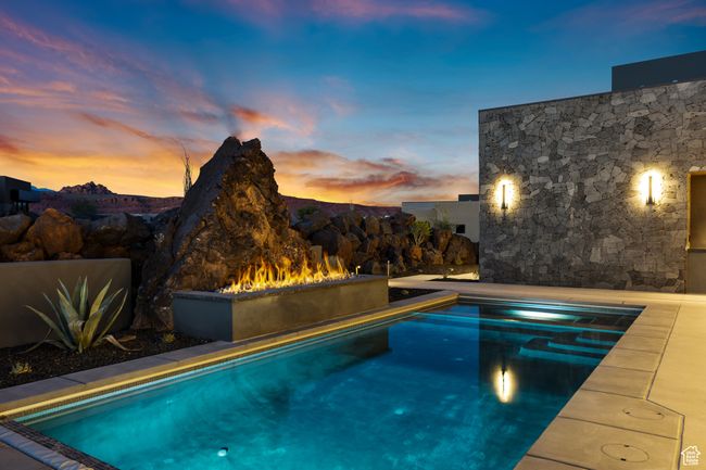Outdoor pool featuring a jacuzzi | Image 13