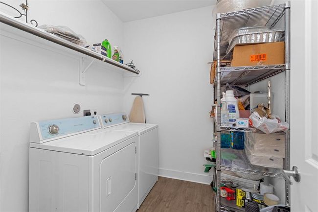 Oversized and ultra-functional, the laundry room offers plenty of space for folding, sorting, or even adding a utility area for storage or hobbies. | Image 30