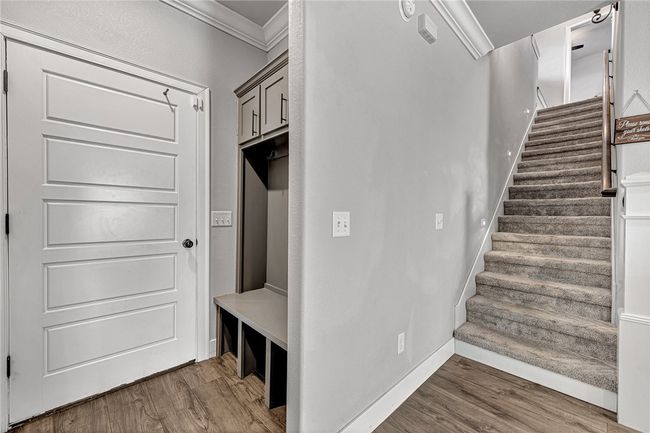 First bedroom at the top of the stairs is being used as a media/game room. | Image 19