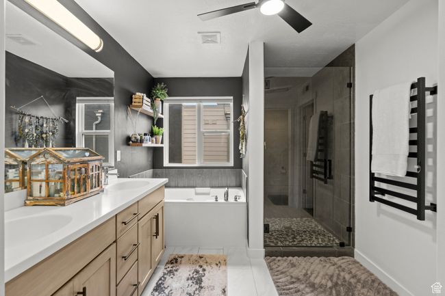 Full bathroom with a garden tub, double vanity, a shower stall, and ceiling fan | Image 21