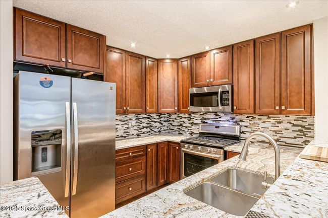 443 Hawthorne Ct, Townhouse with 2 bedrooms, 2 bathrooms and null parking in Indian Harbour Beach FL | Image 15