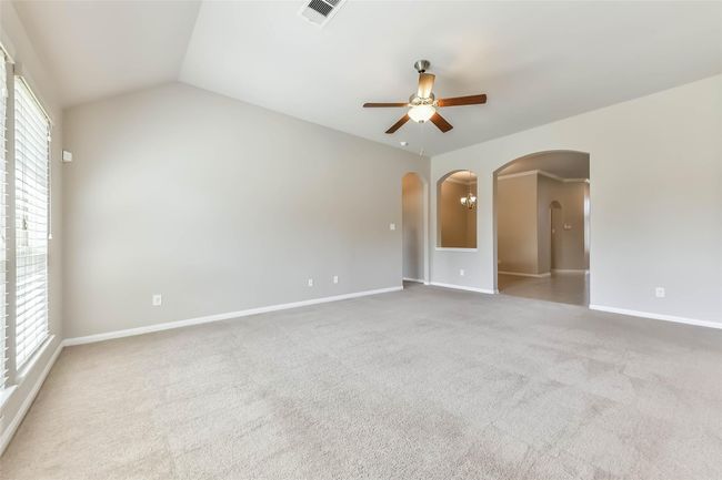 living room with view to dining/flex area | Image 11