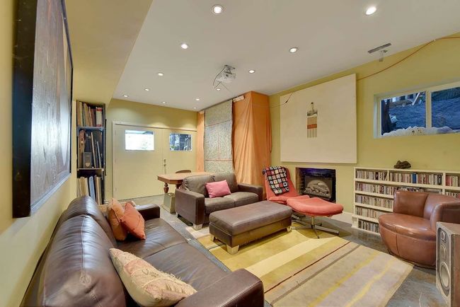 Living room with recessed lighting and a fireplace | Image 19