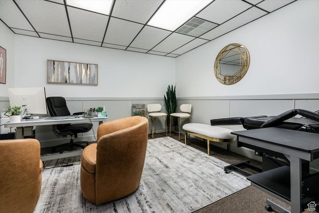 Carpeted office space with a drop ceiling | Image 10