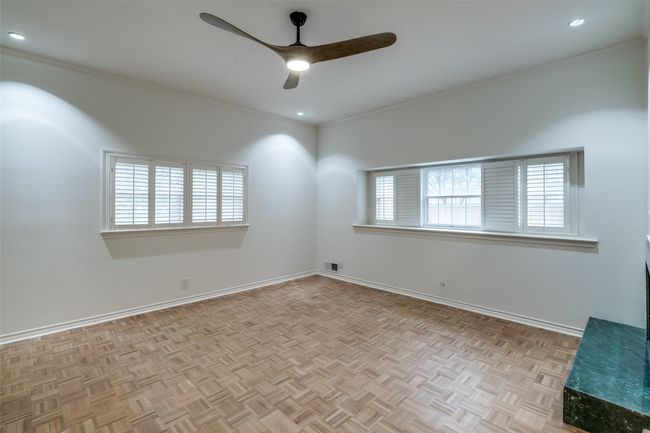 Spare room featuring ceiling fan, ornamental molding, baseboards, and recessed lighting | Image 19