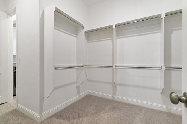 Walk in closet featuring carpet floors | Image 20