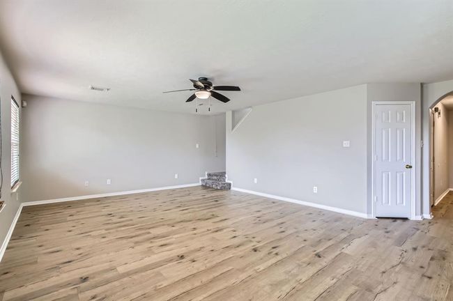 Family Room has beautiful brand new luxury vinyl flooring. | Image 13